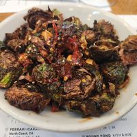 Brussel sprouts (crisp fried, kung pao vinaigrette, scallions, cashews) at Sixty Vines in Plano