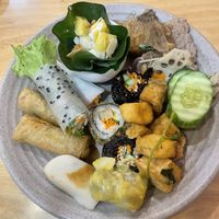 This white thing with sauce is really yuck 🤢  at Homie Vegan in Hanoi