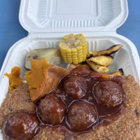 Boulettes de simili avec sauce et purée de mais typique  at Healthy Lifestyle Center and Deli in Nassau