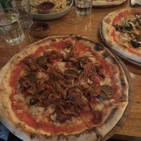 vegan pepperoni pizza with added bbq jackfruit  at Nourish - Uluwatu in Pecatu