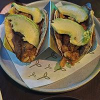 TACOS CHICHARRÓN CON PAPAS Y CHORIZO SALSA VERDE Y ROJA at Alguito Vegano in Mexico City