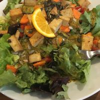 Large salad with tofu and curry-mustard dressing. Delicious and filling portion! at Katzentempel - München in Munich