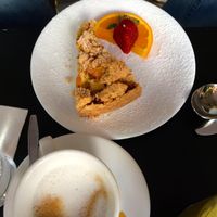 Vegan crumble cake with coffee.  at Katzentempel - München in Munich