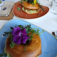 Avocado and sausage bagel  at Joys Coffee House in Otley