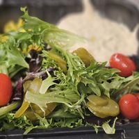 Side salad with hummus that comes with the combo. Balsamic vinaigrette is the only vegan dressing offered. at Urban Grill & Salad in Rancho Cordova