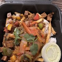 Vegan lomo saltado  at Sabores in Logan