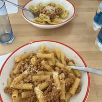 Pumpkin ravioli (yum), bolognese pasta (good)  at La Vegana in Ferrara
