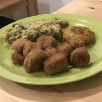 Seitan bites, croquette of vegetables and vegan cheese and broccoli with tahini at La Vegana in Ferrara