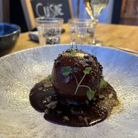 Poached pear with vanilla and chocolate saucee  at Etika in Bidart