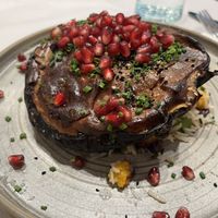 Roasted aubergine main  at Honey & Co in London