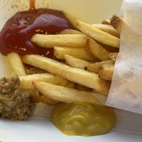 Fries with ketchup & mustard  at Universal Studios - Hot Dog Hall of Fame in Orlando