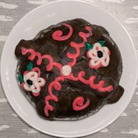 pan de muerto decorated by 222 Pastry at La Casa de Mamá - Pop Up in Portland