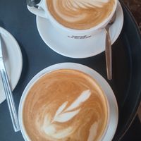 Flat white with oat and soy milk at Caffè Nero in Sligo