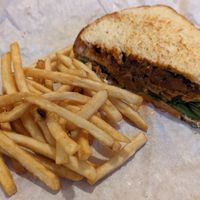 half of Mirisata's Chick'n Club Sando (no tomato) with some fries at Cooper's Co-op Cafe in Portland
