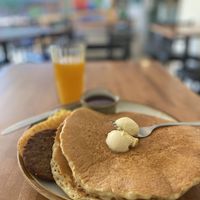 Chocolate chip pancake combo w/ sausage, just-egg scramble, hash brown, & fresh squeezed OJ  at Cooper's Co-op Cafe in Portland