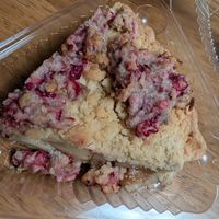 Apple pie with cranberry topping at Village Farmacy  in Poland