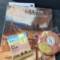 Treats for the road and a book from the library store .  at Village Farmacy  in Poland