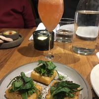 Chick pea chips with peas. Rovi Bellini in the background.   at ROVI in London