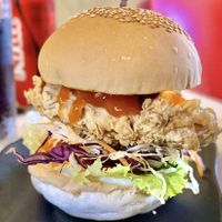 Look at that flaky batter! Wildly good  at Burgeryyy Downtown in Hanoi