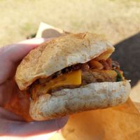 Spicy burger with vegan cheese topping at Veggie Junkies Burger in Kobe