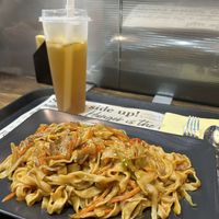 Fried noodles and iced jasmine green tea at Happy Veggie - 天街素食 in Budapest