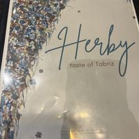 menu cover  at Herby Restaurant in Toronto