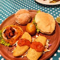 Plate of antojitos and vegan quesadillas in the back #Veganuary at Café La Tinaja in Huehuetenango
