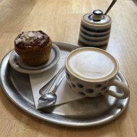 Delicious cinnamon bun with coconut flakes   at Mamacoffee - Jiřího z Poděbrad  in Prague