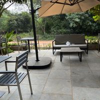Lots of outdoor seating   at The Sprout in Auroville