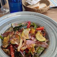 sautéed veggies and boring bread in the back at Toro Tapas Ronda in Ronda