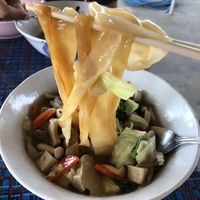 Luxuriously thick rice noodles in gravy with a generous portion of tofu and veggies, seasoned with white pepper. Very tasty!  at Vegetarian for Healthy in Chiang Dao