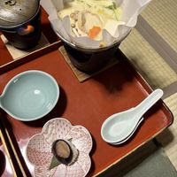 Soy milk tofu hotpot with roast aubergine in the background   at Fukuchiin - 福智院 in Wakayama