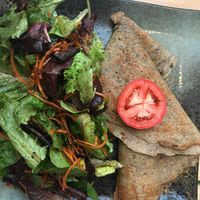 Savory Crepe with a yummy cashew cheese, mushrooms, and peppers, served with a large side salad. Fantastic!! at Invitation V in Montreal