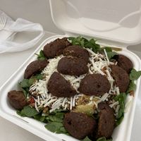 Farro salad with vegan mozz and impossible meatballs  at Sycamore Brewing in Charlotte