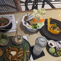 Tofu pad thai, vegan broth (mixed mushrooms), soy bean dip with veg, kao soi (a red Thai curry with crispy noodles) at Vegan Mahanakhon in Bangkok