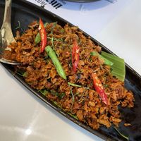 Stir-fried vegan crispy gourami with curry paste  at Vegan Mahanakhon in Bangkok