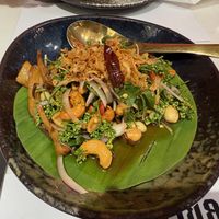 Neem salad with vegan fish sauce at Vegan Mahanakhon in Bangkok