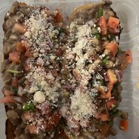 Molletes as delivery order  at Café Mas in Chicago