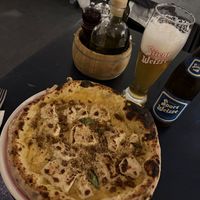 Amatriciana Pizza and NA beer  at Meow Pizzeria Verde in Innsbruck