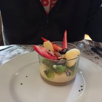 Postre de crema de vainilla y fruta at Restaurante As Maceiras in Ourense