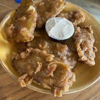 Fried Pickles with Vegan Ranch  at The Good Home in Pegasus