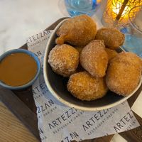 Loukoumades dessert (Greek doughnuts in cinnamon sugar with biscoff dipping sauce)  at Artezzan  in Chester