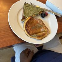 Plated french toast with pistachio cream and pancake. Almost started eating before the pic 😊  at Replika in Dubai