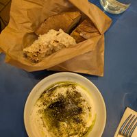 Bread bag and labneh at Goli Restaurant in Budapest