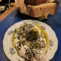 Labaneh and bread bag at Goli Restaurant in Budapest