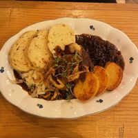 Mixed platter; bread dumplings, cabbage (yummy), seitan  at Moment in Prague