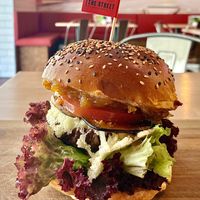 Grilled pear, onion chutney, Parmesan, eggplant bacon, and walnut & maple syrup burger at The Street - Belehradska in Prague