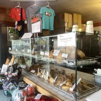 Merch and Checkout Area  at Nick's Pizza in Oakland