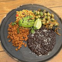 Gluten free breakfast bowl, subbed bread for extra beans. Added avocadoo  at Sweet Spot in Puerto Escondido
