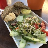 Salad with bread and different kind of dips at Symbiose in Leipzig